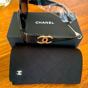 New in box authentic Chanel sunglasses black leather and gold CC logo